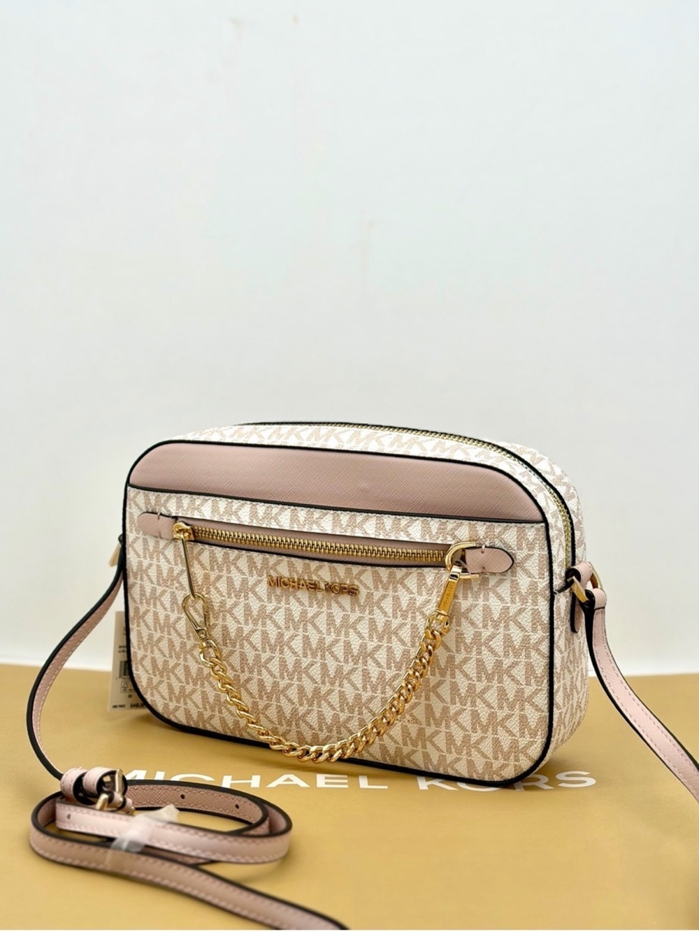 Michael Kors Jet Set Travel EW
Crossbody Bag Optic White Rose Gold